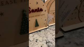 Laser projects loading... Earring Display Stands and Santa Signs. Made on Mira 9🎄