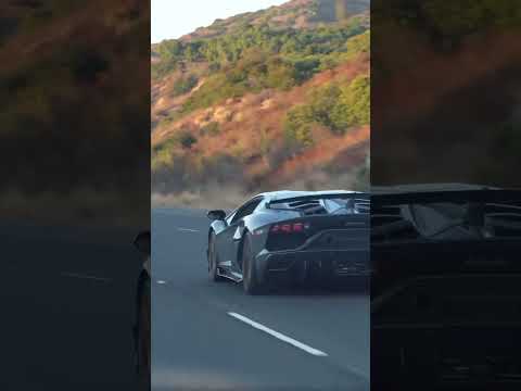 Not one but two  Lamborghinis SvJ shooting flames