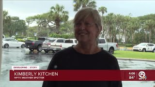 Woman takes cover during tornado warning issued in Fort Pierce