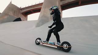 Mary Christina Brown rides two-wheel electric skateboard SPEEDBOARD