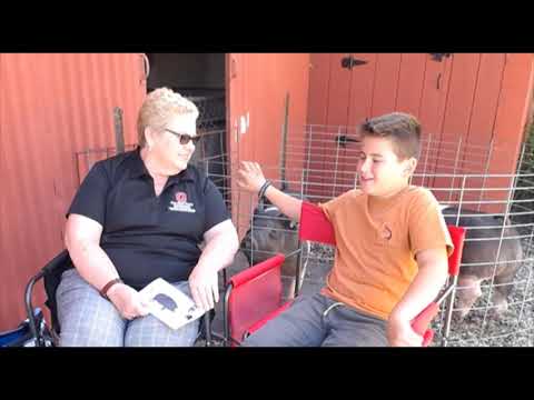 Fairfield Focus: Connie visits with first year 4-H member Parker Reese about his swine project