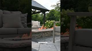 Copthorne pavers in a herringbone pattern create a charming pathway through this outdoor patio.