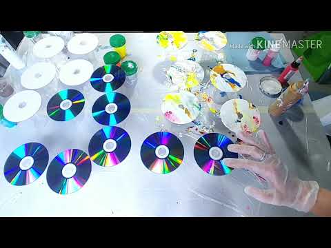 Acrylic pouring: 20 DVD' Dutch pour to make a wind chim.