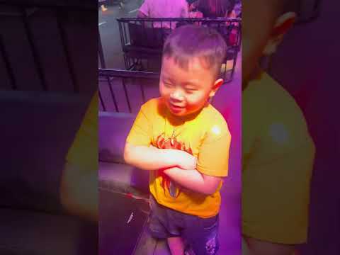 Little boy trying to sell hand fan - watch his expression 📍 walking street , Ho Chi Minh City