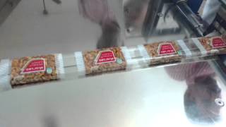 Unveiling Coimbatore's Chikki Packing Magic with Horizontal Flow Wrapper Machines