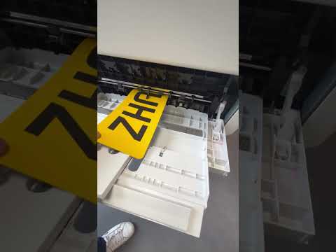 White under on Nikkalite media Number Plate - Printing on OKI Pro9542 White Toner Printer