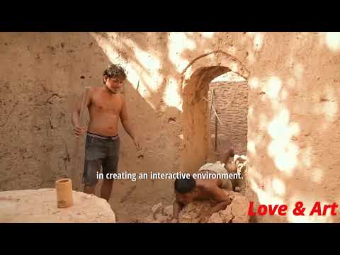 Building underground hut with grass roof & fireplace with clay