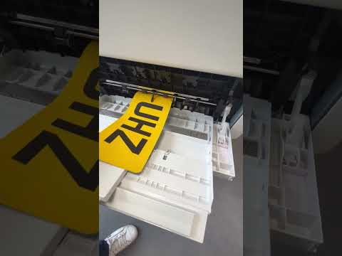 White under on Nikkalite media Number Plate - Printing on OKI Pro9542 White Toner Printer