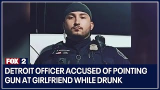 Detroit officer accused of pointing gun at girlfriend while drunk