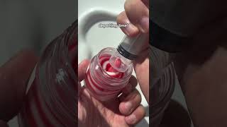 Turning my Laneige Candy Cane Lip Sleeping Mask into a squeezey lip tube! Would you try this? ❤️🌀