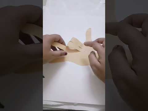 "Creating unique handmade cards with paper! 💌 #DIY #Crafts"