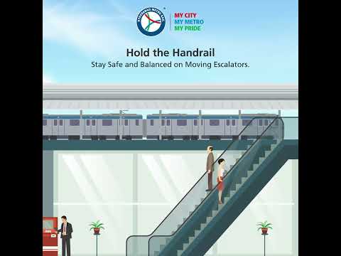 Hold the handrail to stay safe and balanced on moving escalators.