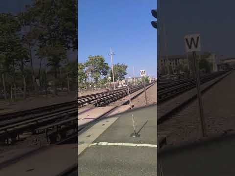 Train's Ronkonkoma Branch Crossing South 18th Steet in Wyandanch, NY  Summer day