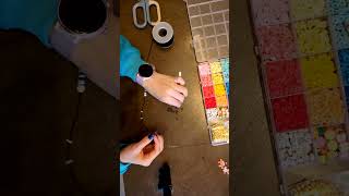 Time lapse of a blue and black bracelet