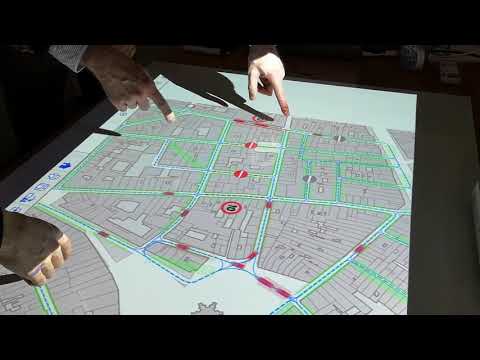 Interactive tabletop projector in action