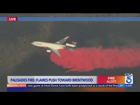 Palisades Fire pushes toward Brentwood, aerial crews work to save homes