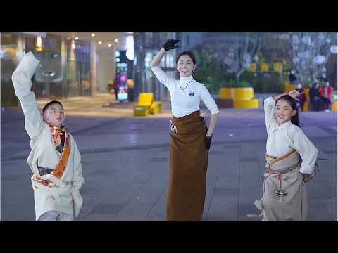 Tibetan dance performed by the Tibetan sisters and brother is so wonderful