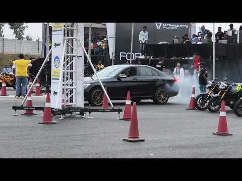 Female drag racer setting the time on Indian street legal car and the Mercedes C 200 - Vroom 2023