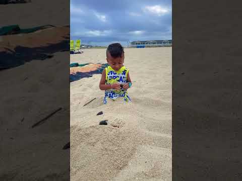 Cute baby hiding his legs with beach sand🌊☀️😍 #shorts