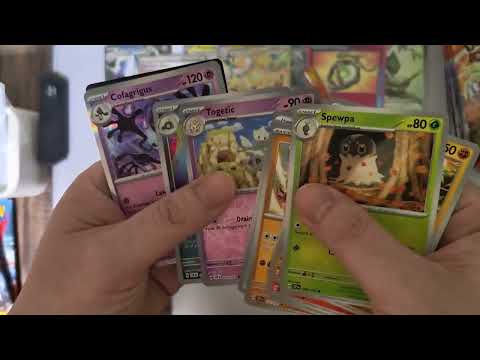 Ripping my 4th box of Surging Sparks (Box 4 of 6)