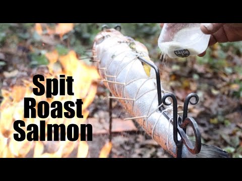 Whole Spit-Roast Salmon Cooked over a Campfire.  Christmas 2021.