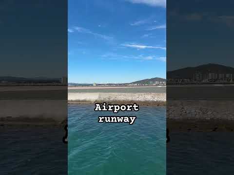 Boating Past Gibraltar Airport Runway