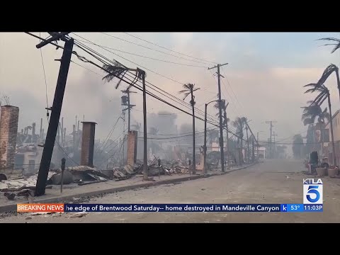 Palisades Fire evacuees start returning, checking on homes before curfew