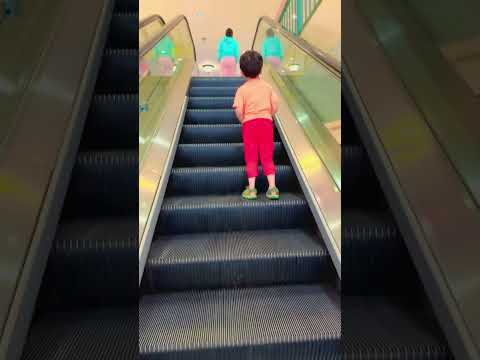 Brave cute baby 🦸😀🚀conquers the #escalator with confidence😀😂