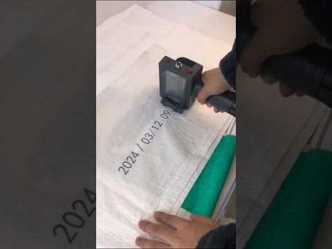 Printing on sack using handheld printer | Printing on rice bag