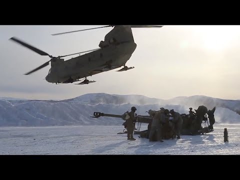 CH-47 Chinook deploys M777 Howitzer for fire mission in cold weather conditions