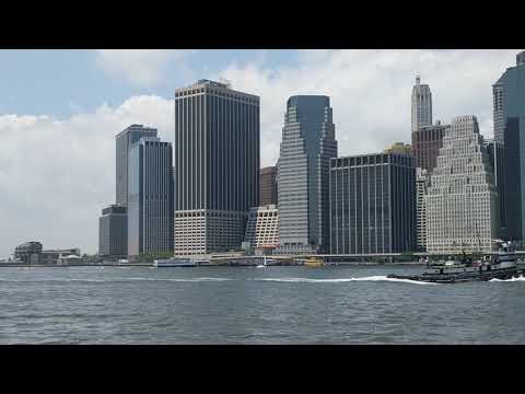 Boat passing Manhattan - Brooklyn Bridge Park