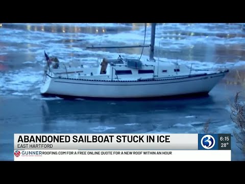 Boat iced in on Connecticut River in East Hartford