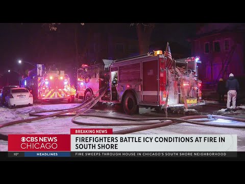 Chicago firefighters battle icy conditions at fire in South Shore