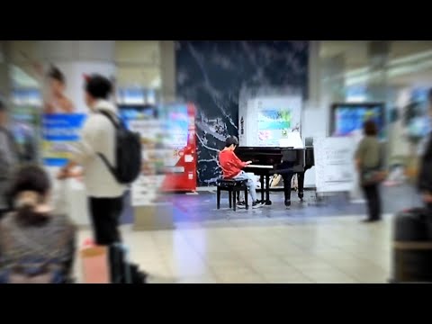 "Battle on the Big Bridge" Played by 11-Year-Old at an Airport Street Piano (from Final Fantasy V)