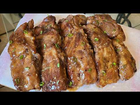 Bourbon Glazed Ribs | Baked pork ribs coated with a sweet and savory Bourbon sauce