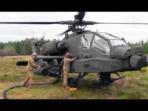 AH-64 APACHE Attack Helicopters conduct HOT REFUELING in the field