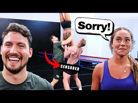 Her hand got caught on his shorts! (cheer fail)