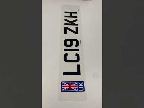 Number Plate Clear HD Film on OKI Pro9542 CMYK+White toner printer.  White under CMYK on film