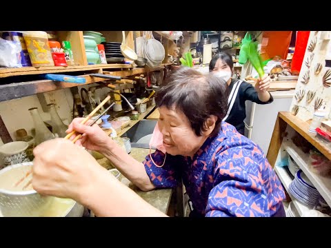 A sushi restaurant run by an elderly couple who have worked there for 15 years without a break.