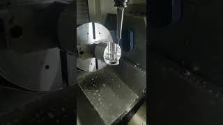 5 axis machining center processing a metal ant