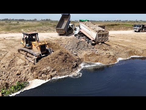 Satisfying Operator Komatsu Bulldozer D53P Pushing Soil Drop To Water