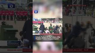 Intruder Pushed Off The Podium After President Tinubu's Inaugural Speech