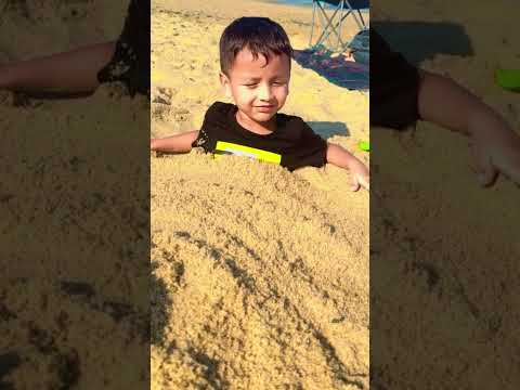 Baby relaxing in beach sand❤️😘👦 #shorts