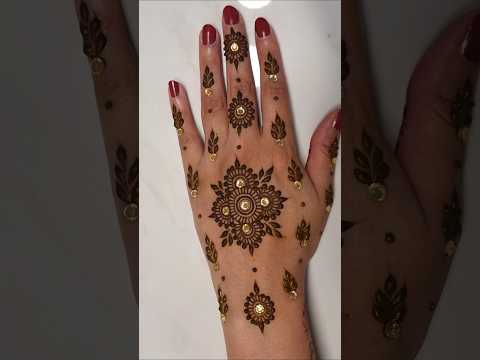 Elegant henna design with gemstones #henna #mehndi #hennadesigns