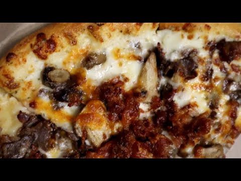 TikTok viral pizza from Domino's review.   Jazz on the river date night.