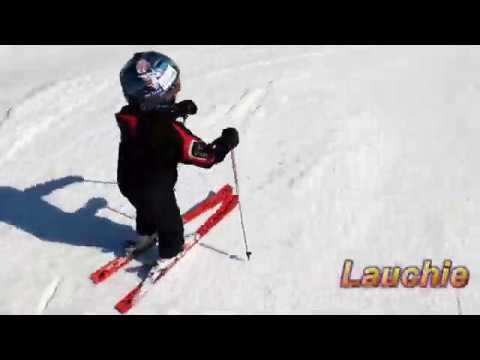 My grandsons skiing and boarding at Okemo