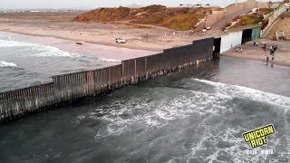 Migrants Cross US/Mexico Border From Tijuana to San Diego