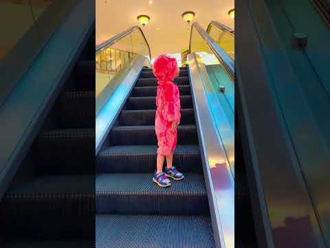 Charming baby navigating the #escalator on his own😃😂🤪