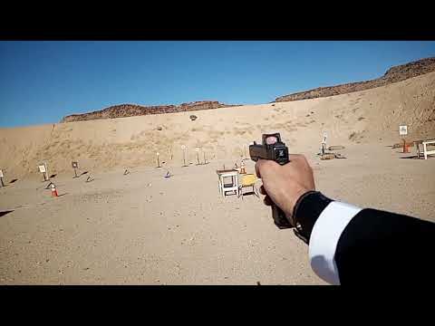 Glock 17 one hand  50 yards Headshots