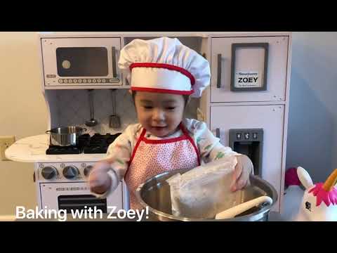 Adorable 2 Year Old Zoey making Carrot Cupcakes with Cream Cheese frosting!